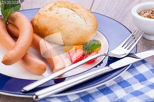 Image of tasty sausages frankfurter with grain bread 