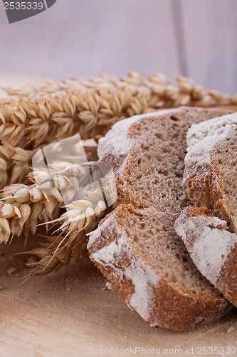 Image of homemade fresh baked bread and knife 