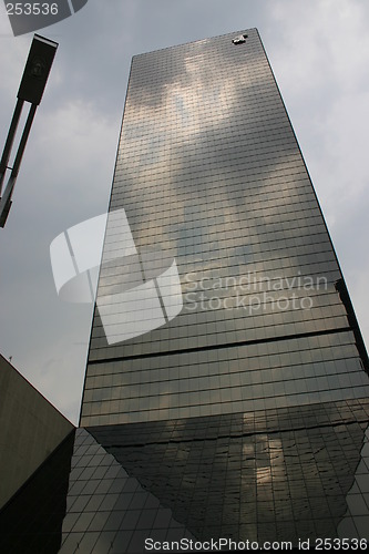 Image of Skyscraper with reflecting clouds