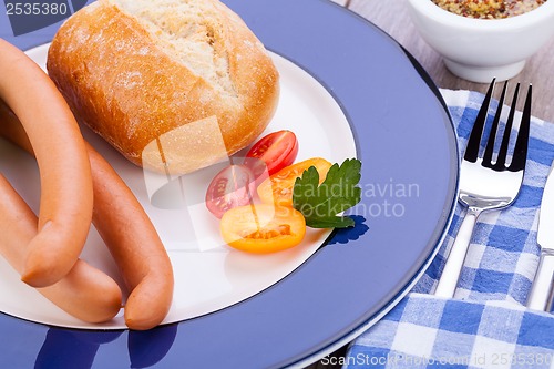 Image of tasty sausages frankfurter with grain bread 