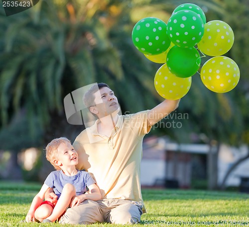 Image of family with balloons