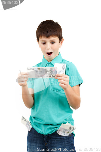 Image of amazed boy looks at the bill