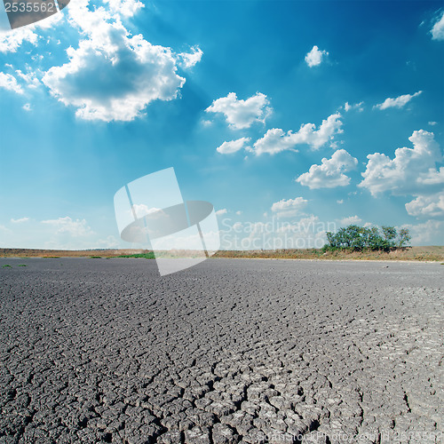 Image of desert and clouds in blue sky