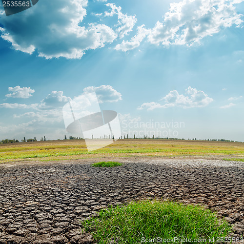 Image of hot sun over drought land