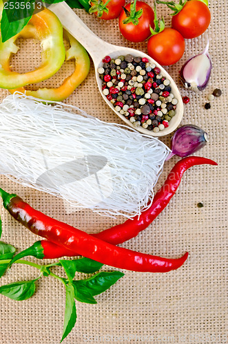 Image of Noodles rice white with a variety peppers and vegetables