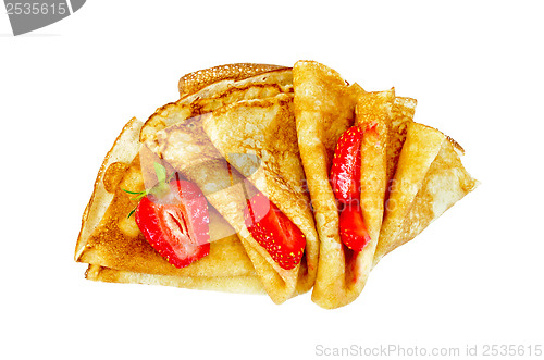 Image of Pancakes with strawberries cut