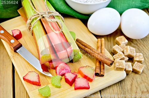 Image of Rhubarb with sugar and eggs on the board