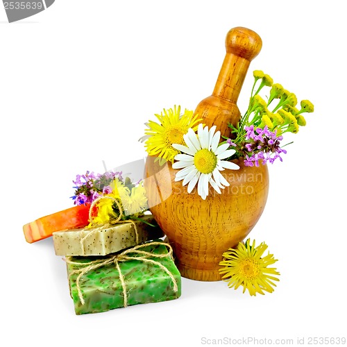 Image of Soap homemade with wildflowers in a mortar