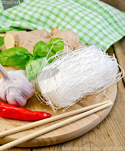 Image of Noodles rice thin with a napkin on the board