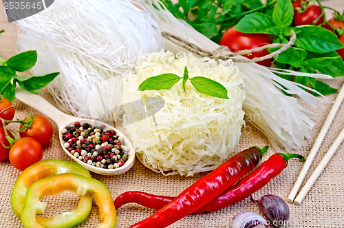 Image of Noodles rice different with peppers and vegetables on sacking