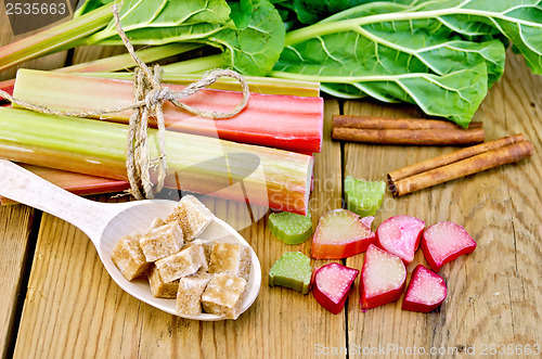 Image of Rhubarb with sugar and cinnamon on the board
