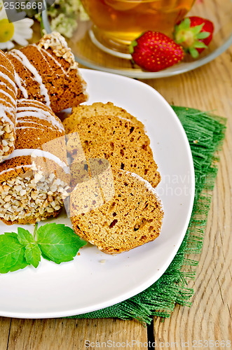 Image of Cookies honey with strawberries on board