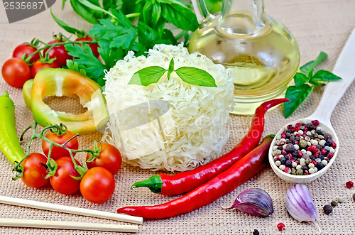 Image of Noodles rice twisted with oil and vegetables