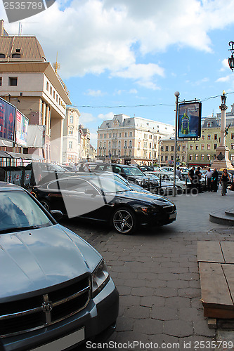 Image of street in Lvov with parked cars