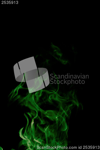 Image of green fire on black background