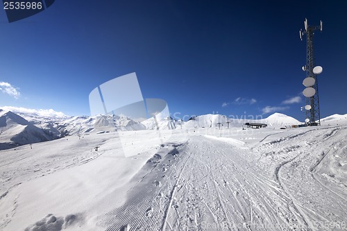 Image of Ratrac ski road at nice sun day