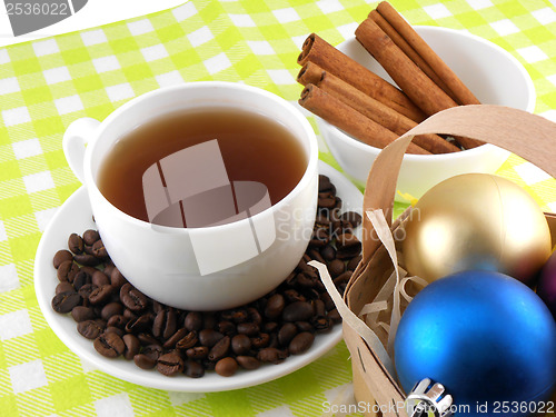 Image of Christmas decoration with cup of coffee, coffee beans and cinnamon