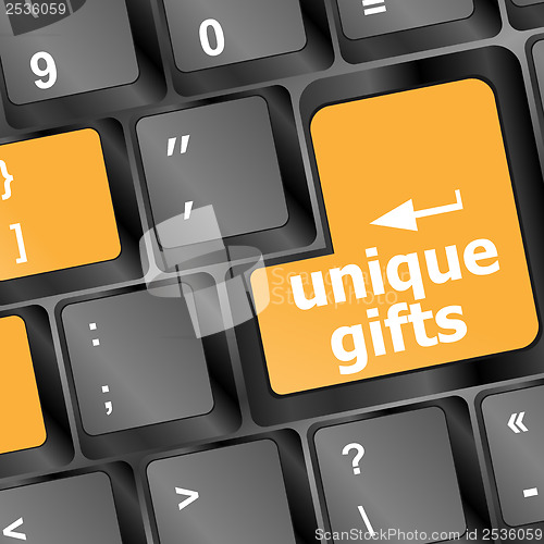 Image of unique gifts on the keyboard - holiday concept