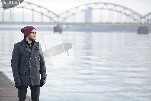 Image of Young man near the river