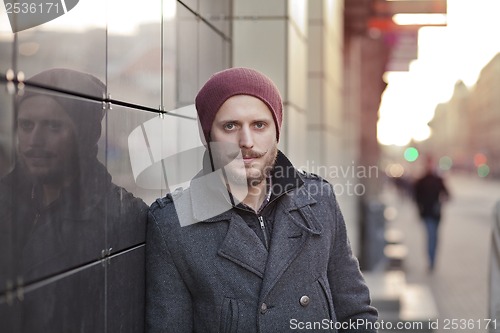 Image of Young man with moustache and beard