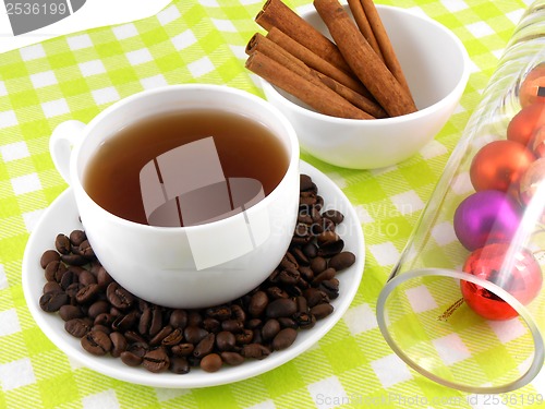 Image of Christmas decoration with cup of coffee, coffee beans and cinnamon