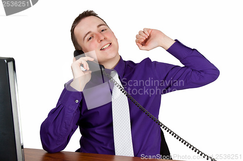 Image of Businessman calling