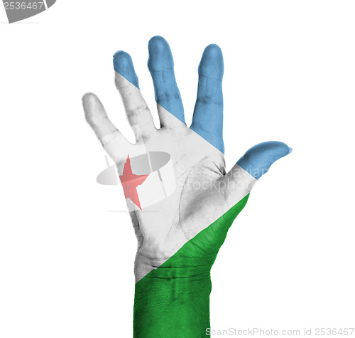 Image of Palm of a woman hand, painted with flag