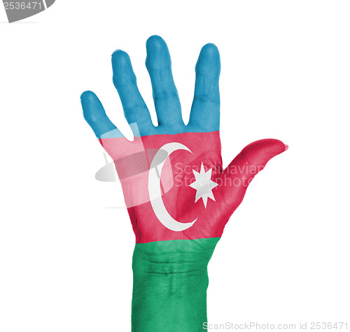 Image of Palm of a woman hand, painted with flag