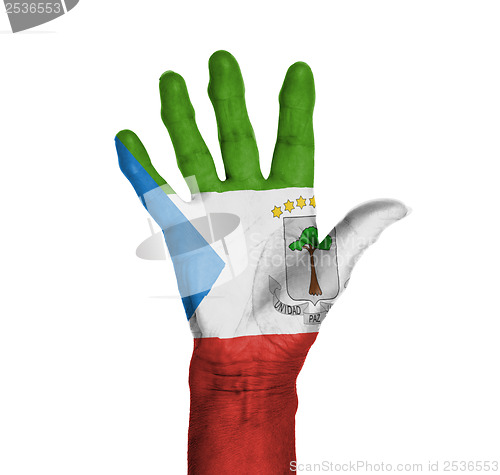 Image of Palm of a woman hand, painted with flag