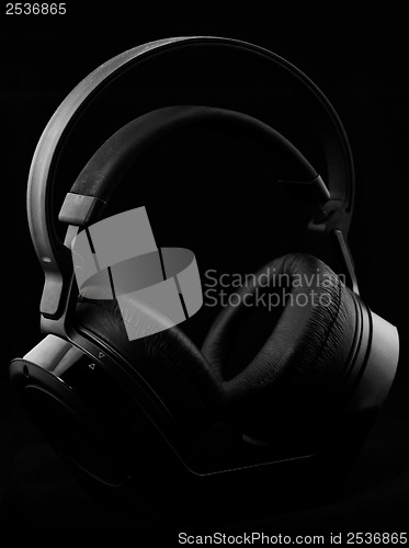 Image of Headphones on black background