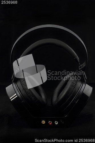 Image of Headphones on black background