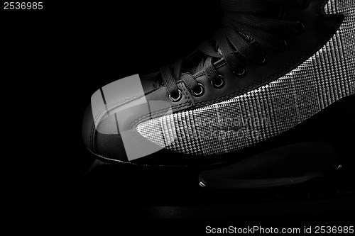 Image of Black skates close up