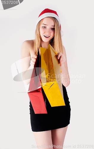 Image of Blond woman with shopping bags