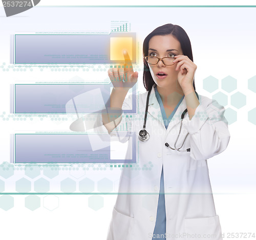 Image of Female Doctor or Nurse Pushing Blank Button on Panel