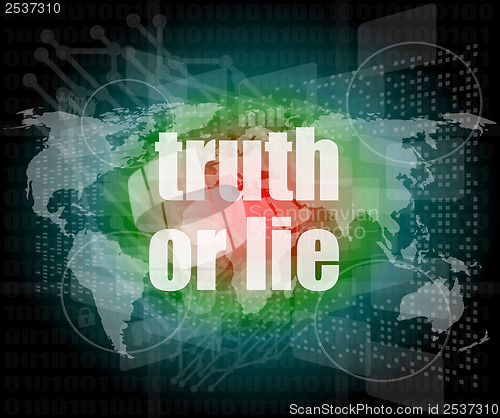 Image of truth or lie text on digital touch screen interface