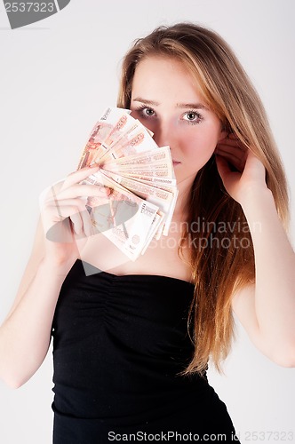 Image of Beautiful young lady with cash