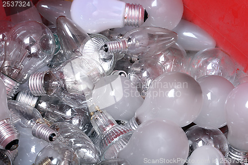 Image of Old Light Bulbs in garbage can