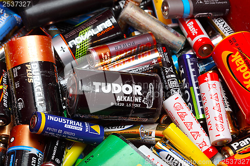 Image of Assorted Household Batteries in garbage can
