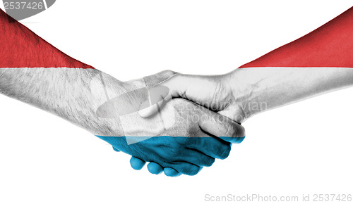 Image of Man and woman shaking hands