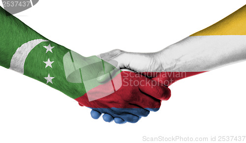 Image of Man and woman shaking hands