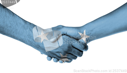 Image of Man and woman shaking hands