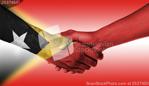 Image of Man and woman shaking hands