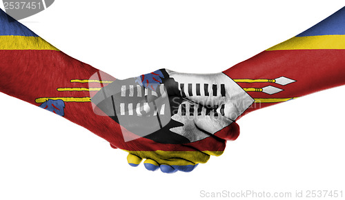 Image of Man and woman shaking hands