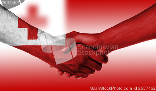 Image of Man and woman shaking hands