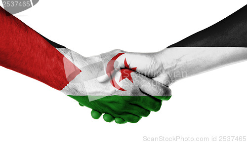 Image of Man and woman shaking hands