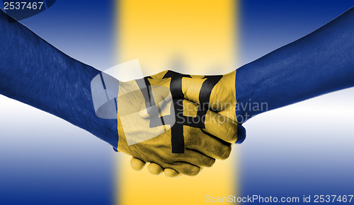 Image of Man and woman shaking hands