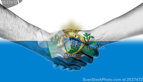 Image of Man and woman shaking hands