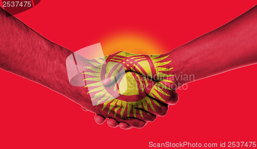 Image of Man and woman shaking hands