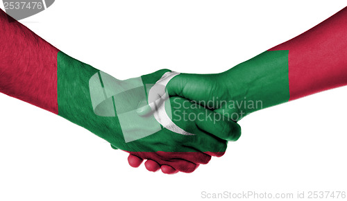 Image of Man and woman shaking hands