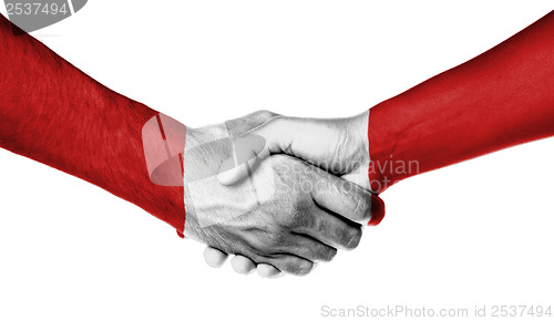 Image of Man and woman shaking hands